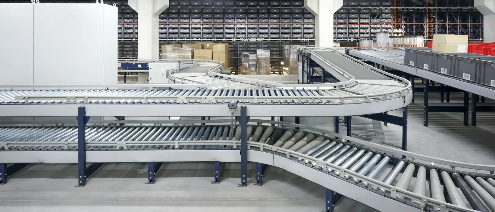 Roller conveyor and sortation lines